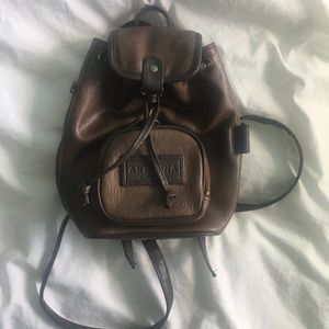 Mini vintage leather backpack